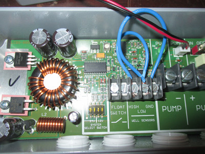 circuit board with terminals
labeled PUMP, PV, HIGH, LOW, GND, FLOAT SWITCH